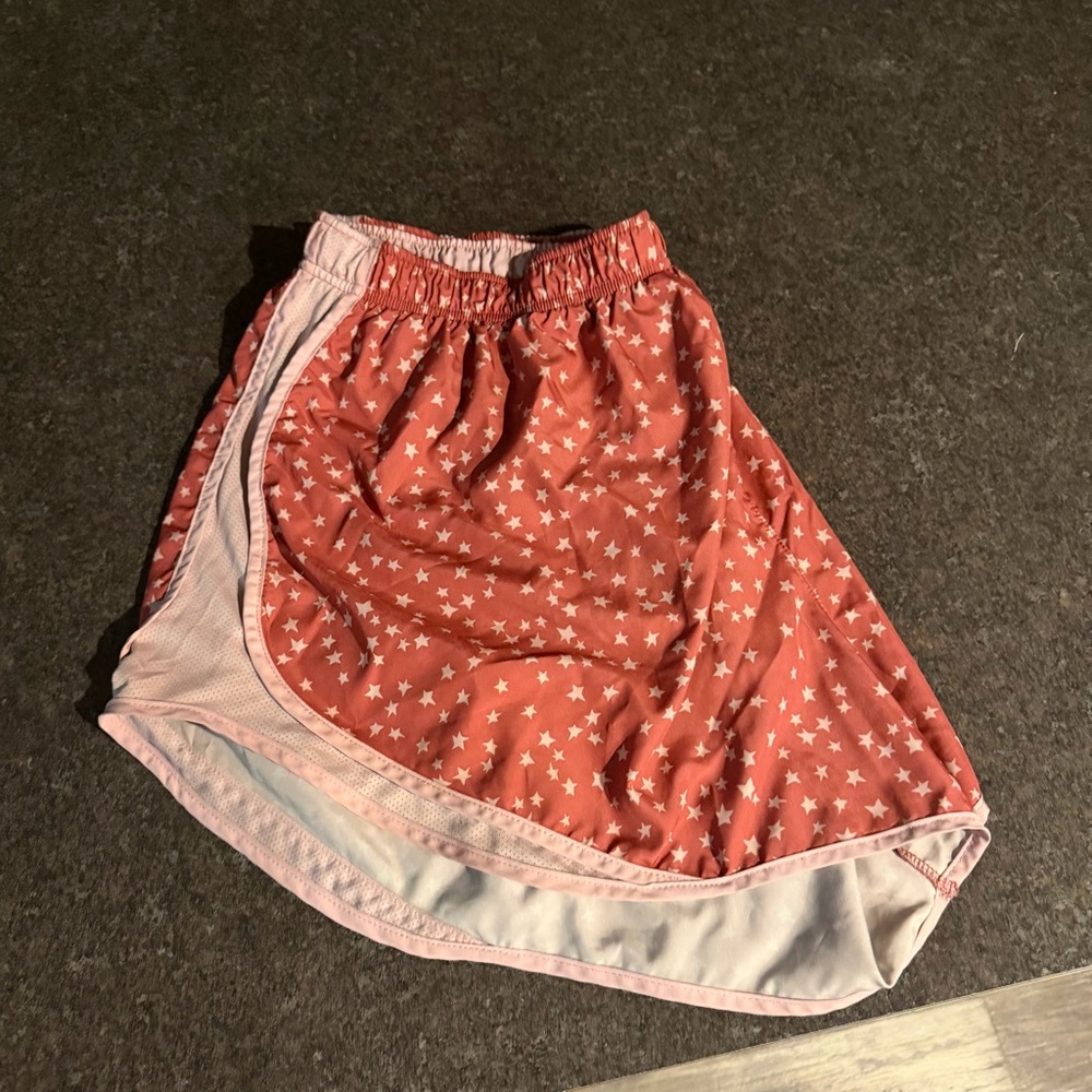 Nike Athletic Shorts with Red and White Star Design